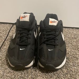 Black and dark green Nikes size 6.5